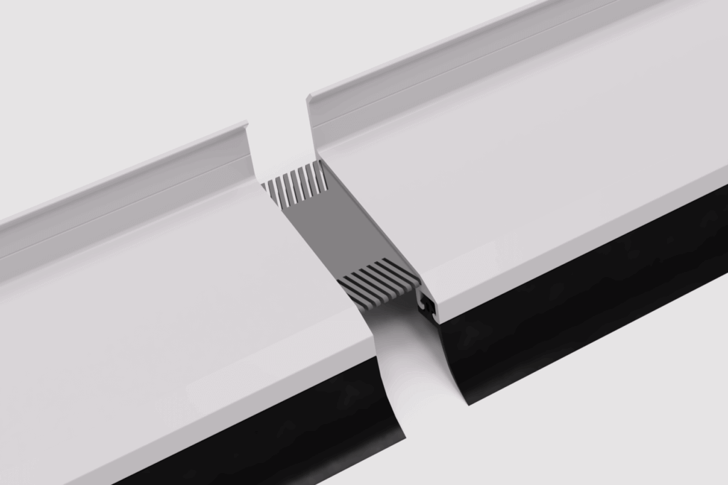 Verbindung zweier weißer Bauteile mit flexibler Dichtung, ideal für strukturierte Übergänge und Abdichtungslösungen.